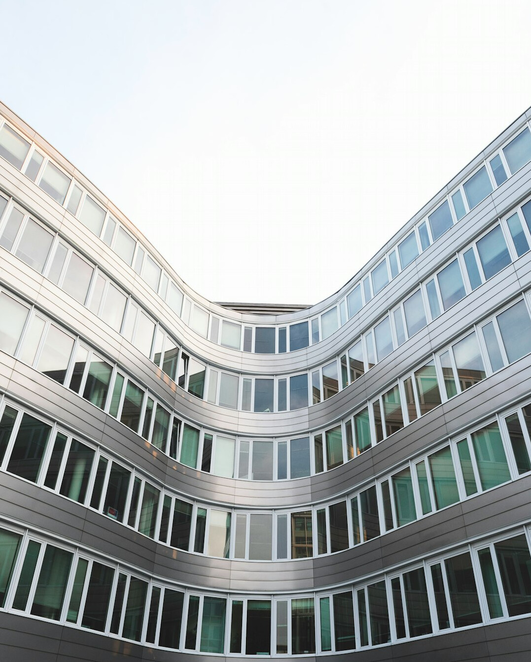 Bright modern open-plan office with large windows